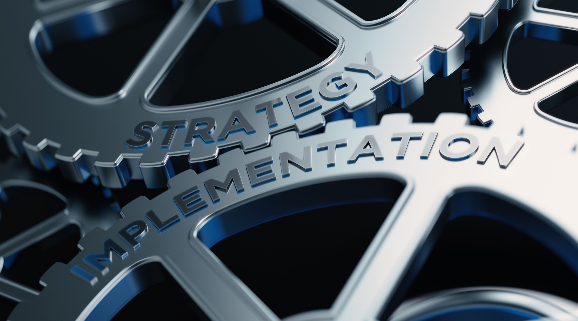 Metal Cogs With Strategy And Implementation Text - Strategy Concept